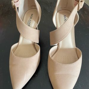 Ladies heels. Cute cross strap, zipper at heel. Size 8.5